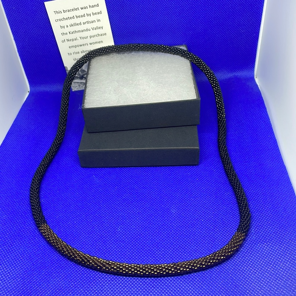 Sashka 24” necklace with box. Black and brown beads.